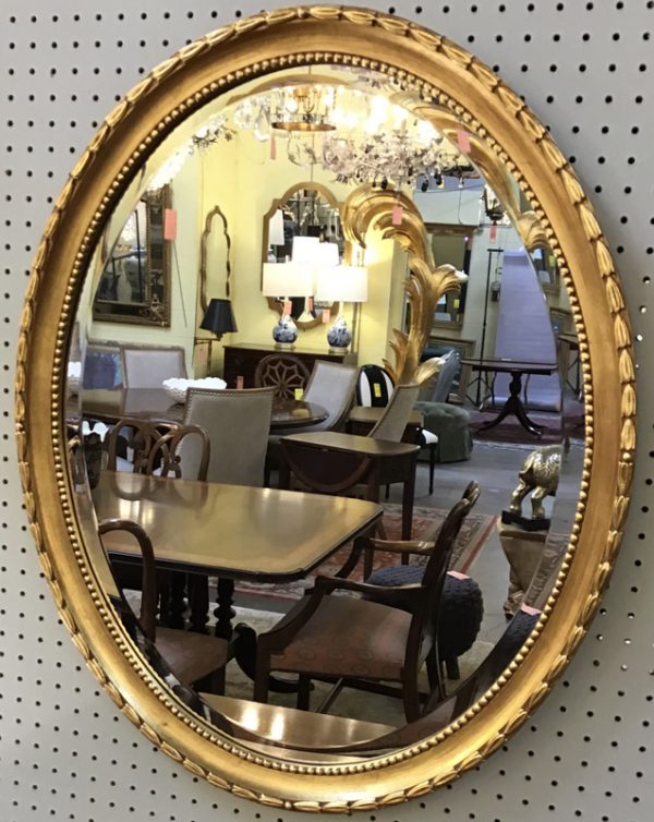 Anna's Mostly Mahogany Consignment - Oval Gilt Mirror